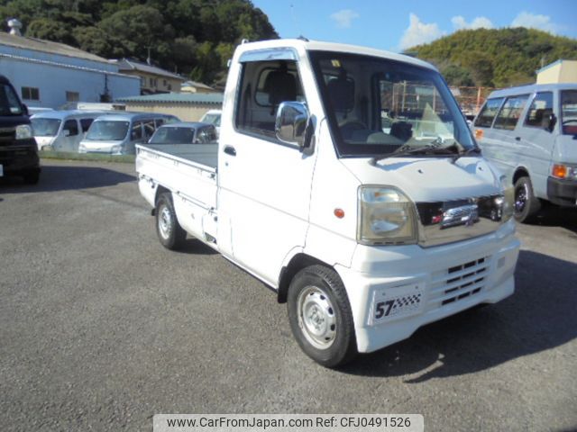 mitsubishi minicab-truck 1999 9395c0a447fc3fb292ffe2799c7fca73 image 1