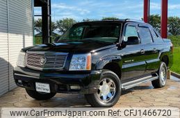 cadillac escalade 2002 GOO_NET_EXCHANGE_0206465A30250724W001