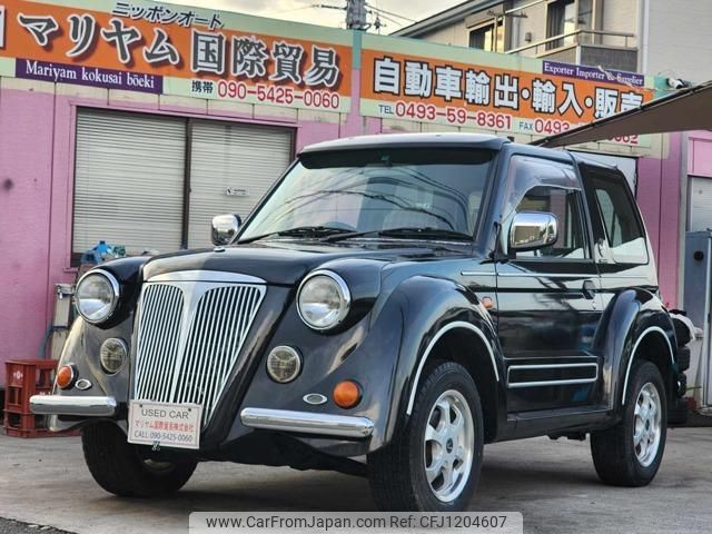 mitsubishi pajero-jr 1998 quick_quick_E-H57A_H57A-5000542 image 1