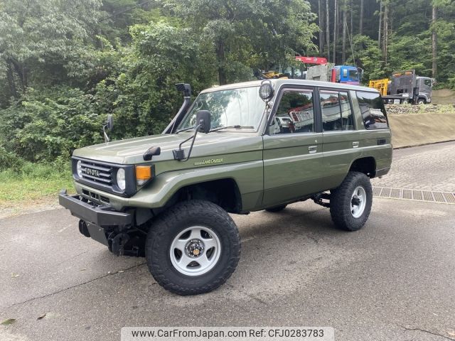 toyota land-cruiser 1998 -TOYOTA--Land Cruiser KC-HZJ77Vｶｲ--HZJ77-0009889---TOYOTA--Land Cruiser KC-HZJ77Vｶｲ--HZJ77-0009889- image 1