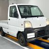 mitsubishi minicab-truck 1999 Mitsuicoltd_MBMT0007463R0705 image 1