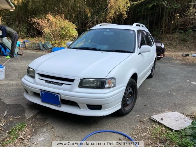 toyota sprinter-carib 2001 -TOYOTA--Sprinter Carib GF-AE111G--AE111-7077055---TOYOTA--Sprinter Carib GF-AE111G--AE111-7077055- image 1