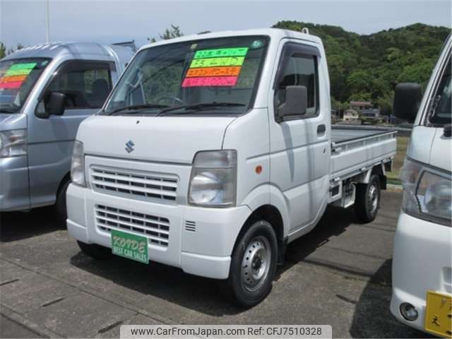 suzuki carry-truck 2010 -SUZUKI--Carry Truck EBD-DA63T--DA63T-703077---SUZUKI--Carry Truck EBD-DA63T--DA63T-703077- image 1