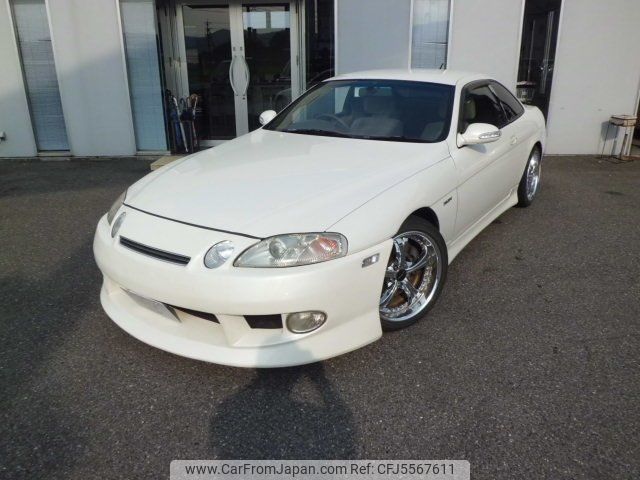 柘榴 21k-Kilometer JDM 1997 Toyota Supra SZ for sale on BaT