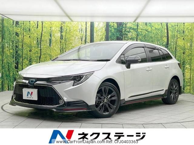 toyota corolla-touring-wagon 2021 -TOYOTA--Corolla Touring 6AA-ZWE211W--ZWE211-6088409---TOYOTA--Corolla Touring 6AA-ZWE211W--ZWE211-6088409- image 1