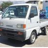 suzuki carry-truck 1998 d0ee62a816f0f2bd4bdd77fd313495fd image 1