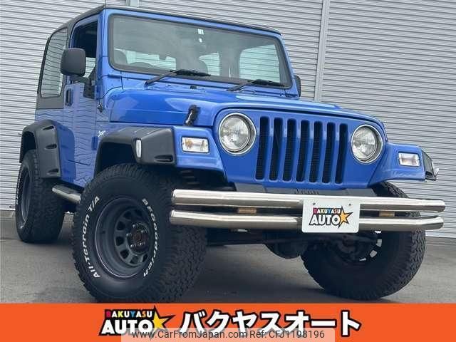 jeep wrangler 1997 quick_quick_TJ40H_1J4-FY19S4VP534124 image 1