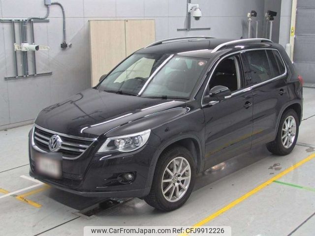 volkswagen tiguan 2011 -VOLKSWAGEN--VW Tiguan 5NCCZ-WVGZZZ5NZBW111058---VOLKSWAGEN--VW Tiguan 5NCCZ-WVGZZZ5NZBW111058- image 1