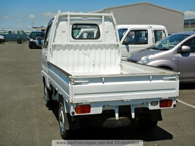 mitsubishi-minicab-truck-1993-980-car_7f3b2b9d-5a6a-47d2-bf34-c60f89ffefba