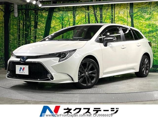 toyota corolla-touring-wagon 2021 -TOYOTA--Corolla Touring 6AA-ZWE211W--ZWE211-6063338---TOYOTA--Corolla Touring 6AA-ZWE211W--ZWE211-6063338- image 1