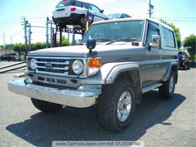 toyota landcruiser-70 2003 -トヨタ--ﾗﾝﾄﾞｸﾙｰｻﾞｰ70 KG-HZJ74K--HZJ74K-0001766---トヨタ--ﾗﾝﾄﾞｸﾙｰｻﾞｰ70 KG-HZJ74K--HZJ74K-0001766- image 1