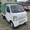 suzuki carry-truck 2010 -SUZUKI--Carry Truck EBD-DA63T--DA63T-702754---SUZUKI--Carry Truck EBD-DA63T--DA63T-702754- image 1