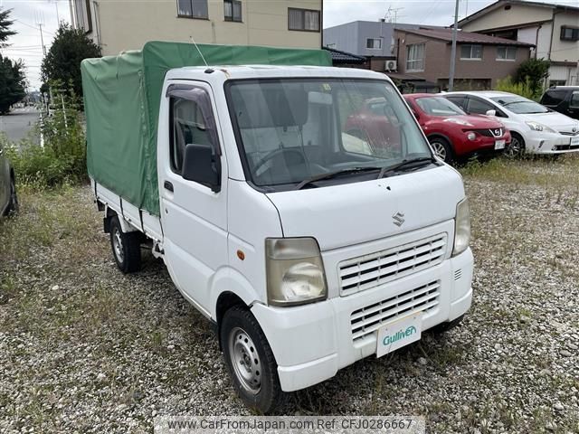 suzuki carry-truck 2010 -SUZUKI--Carry Truck EBD-DA63T--DA63T-702754---SUZUKI--Carry Truck EBD-DA63T--DA63T-702754- image 1