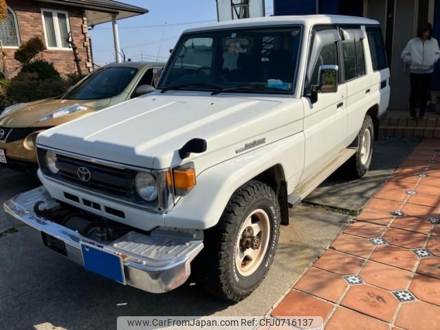 toyota land-cruiser 1999 -TOYOTA--Land Cruiser KC-HZJ77HV--HZJ770010613---TOYOTA--Land Cruiser KC-HZJ77HV--HZJ770010613- image 1