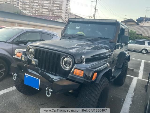chrysler jeep-wrangler 1997 CFJ1850497 image 1