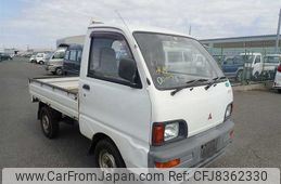 mitsubishi-minicab-truck-1995-1100-car_ba6ad84c-1c62-4193-9256-7f3d2a93cf2e