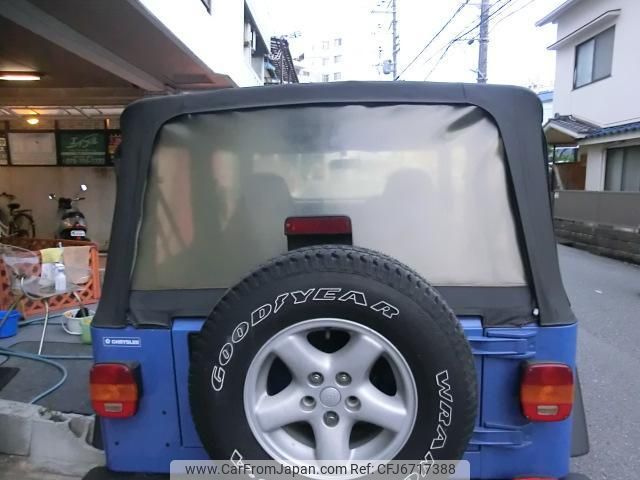 jeep wrangler 1997 quick_quick_E-TJ40H_1J4-FY19S9VP511020 image 2