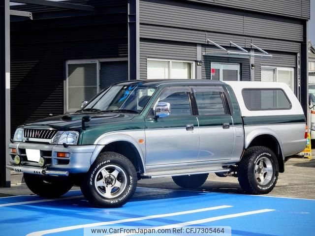 三菱 L200ストラーダ 1998年パリダカ参戦車 三菱 L200ストラーダ 1998年パリダカ参戦車 - メルカリ