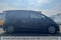 honda freed-hybrid 2014 NIKYO_SM49400