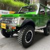 suzuki jimny 1991 -SUZUKI--Jimny M-JA11Vｶｲ--JA11-124988---SUZUKI--Jimny M-JA11Vｶｲ--JA11-124988- image 1