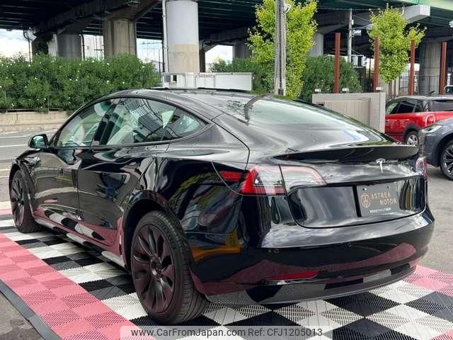 tesla-motors model-3 2022 quick_quick_ZAA-3L13T_LEW3F7FSXNC521727 image 2
