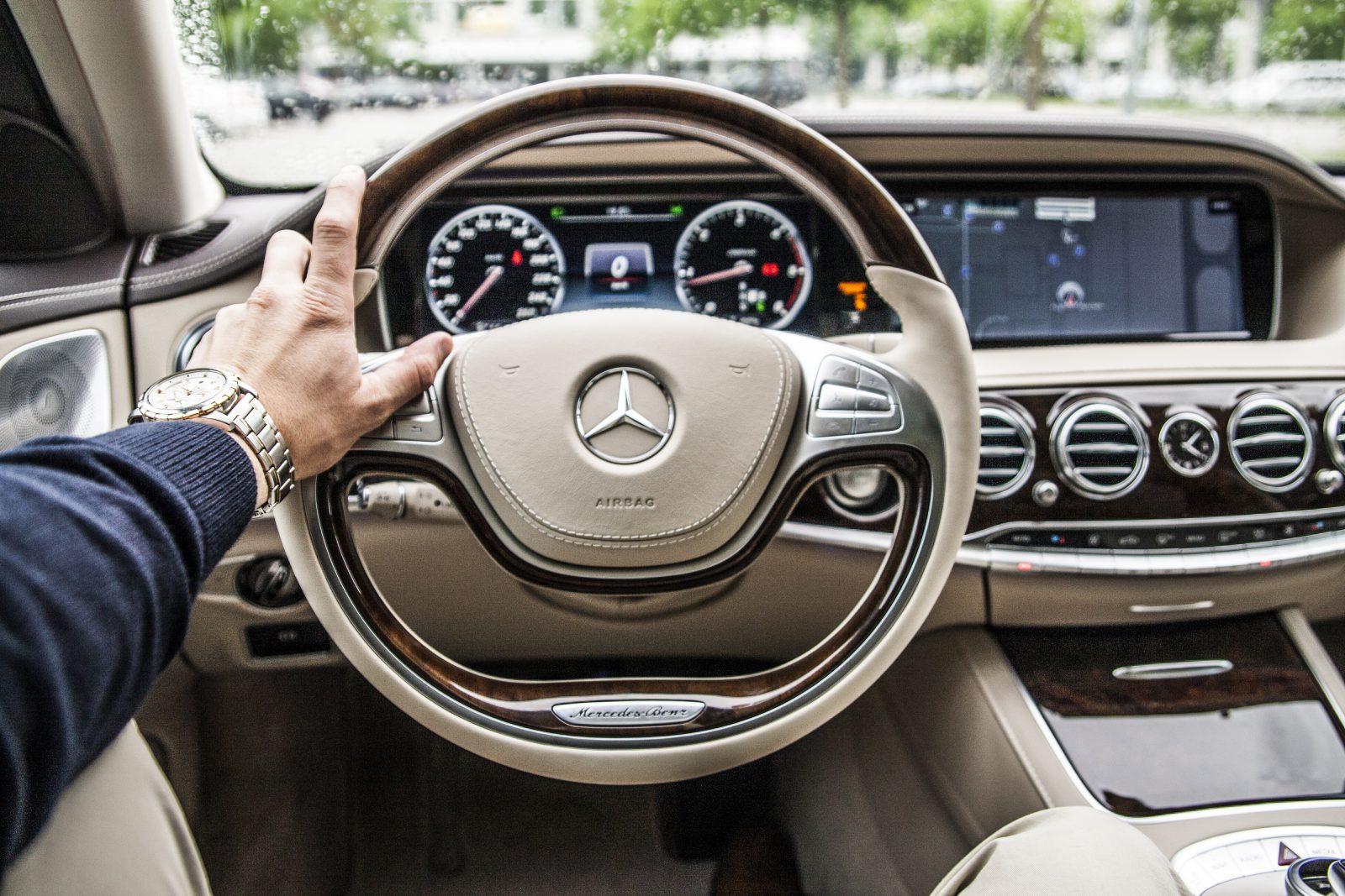 BMW 3 Series vs Mercedes C Class is almost equal in the trustworthy Mercedes steering wheel