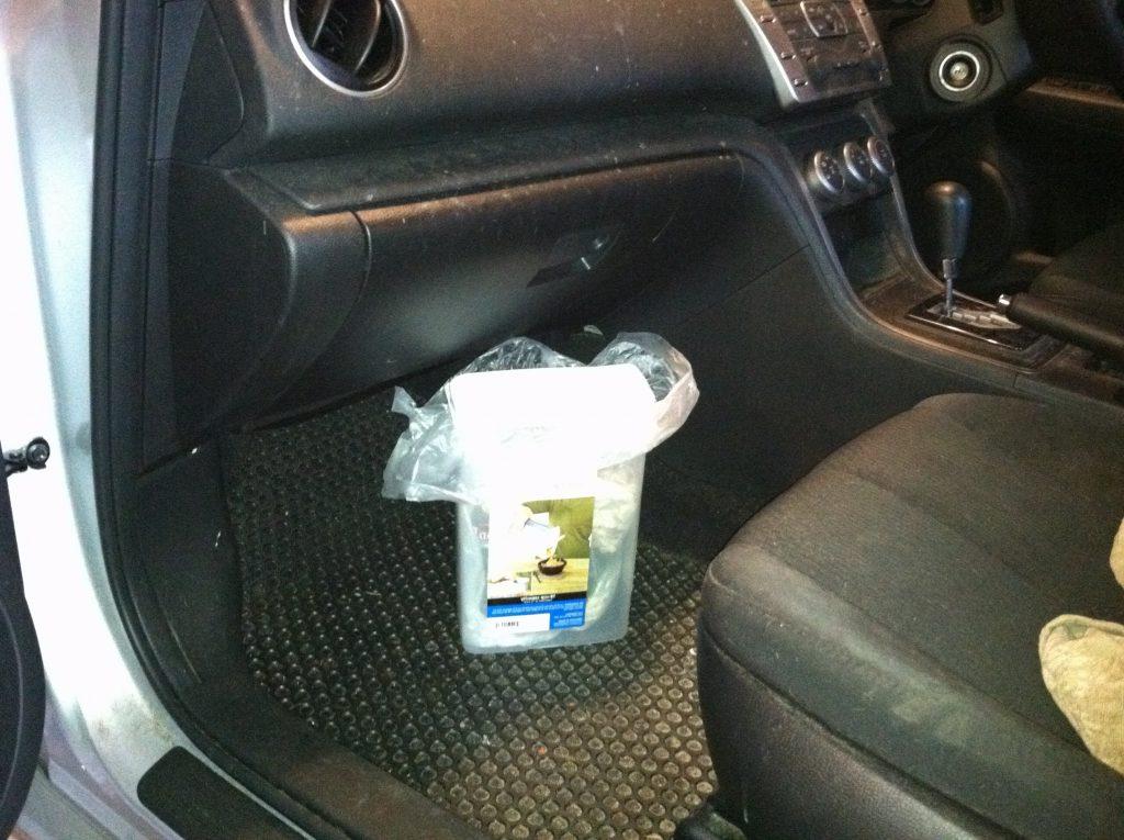Put a cereal container trash inside your car Cereal container trash