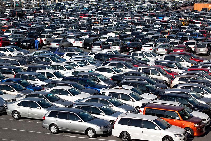 The inusrance company will hold car auctions. flooded cars after Hurricane Harvey