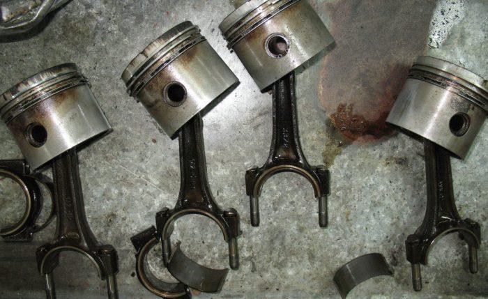 Replace the worn out pistons immediately. low compression engine cylinder