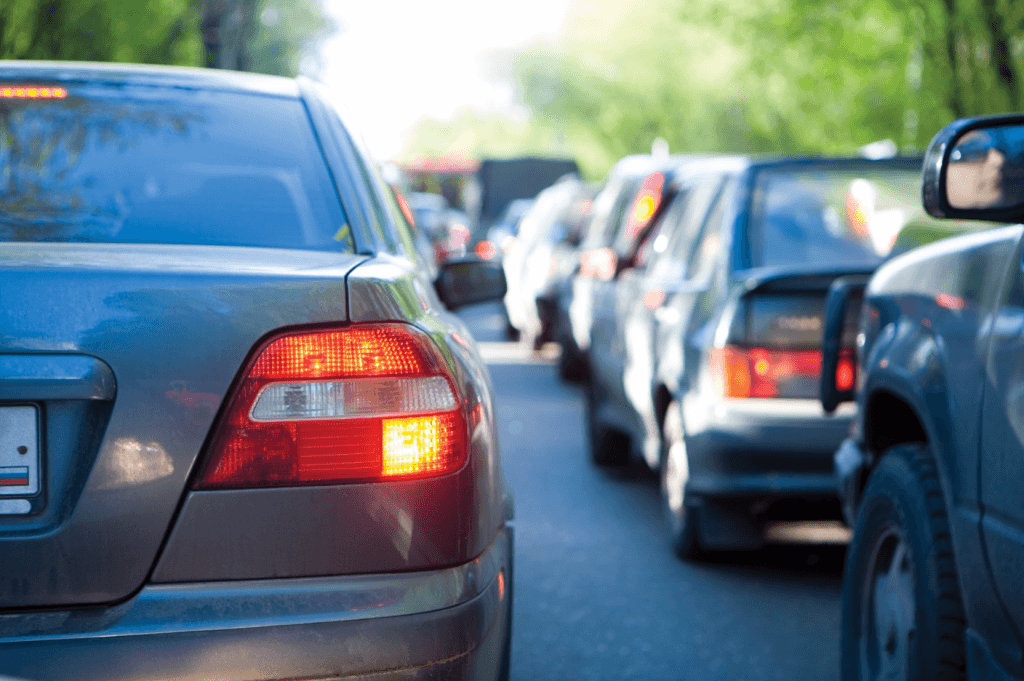 Find yourself a sign or something to calculate the distance Driving tips in heavy traffic