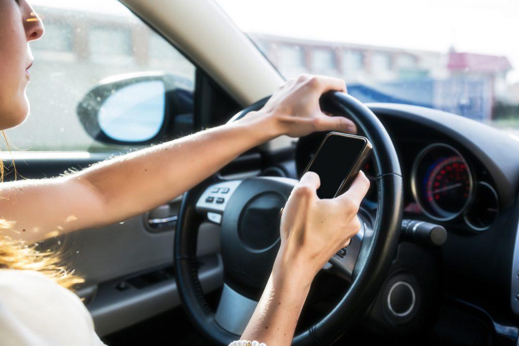 In a crowd road like this, using phone is definitely a bad idea Driving tips in heavy traffic