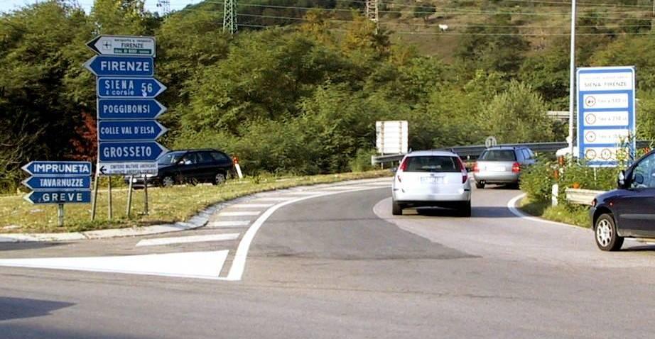 Check the road signs before taking the turn. Turning right driving lesson