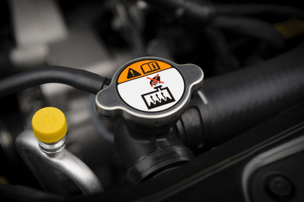 Fill the Coolant Reservoir Tank to avoid overheating for truck Tips to avoid overheating for truck