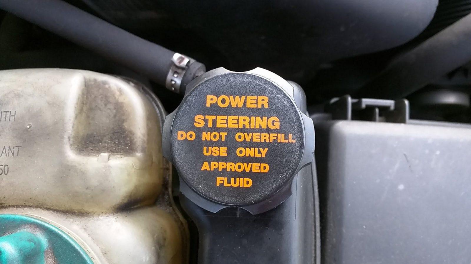 car squeaks when turning left only while driving