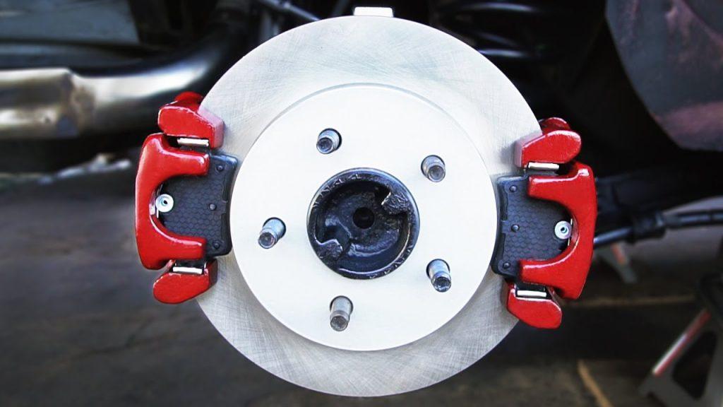 brake caliper sticking symptoms