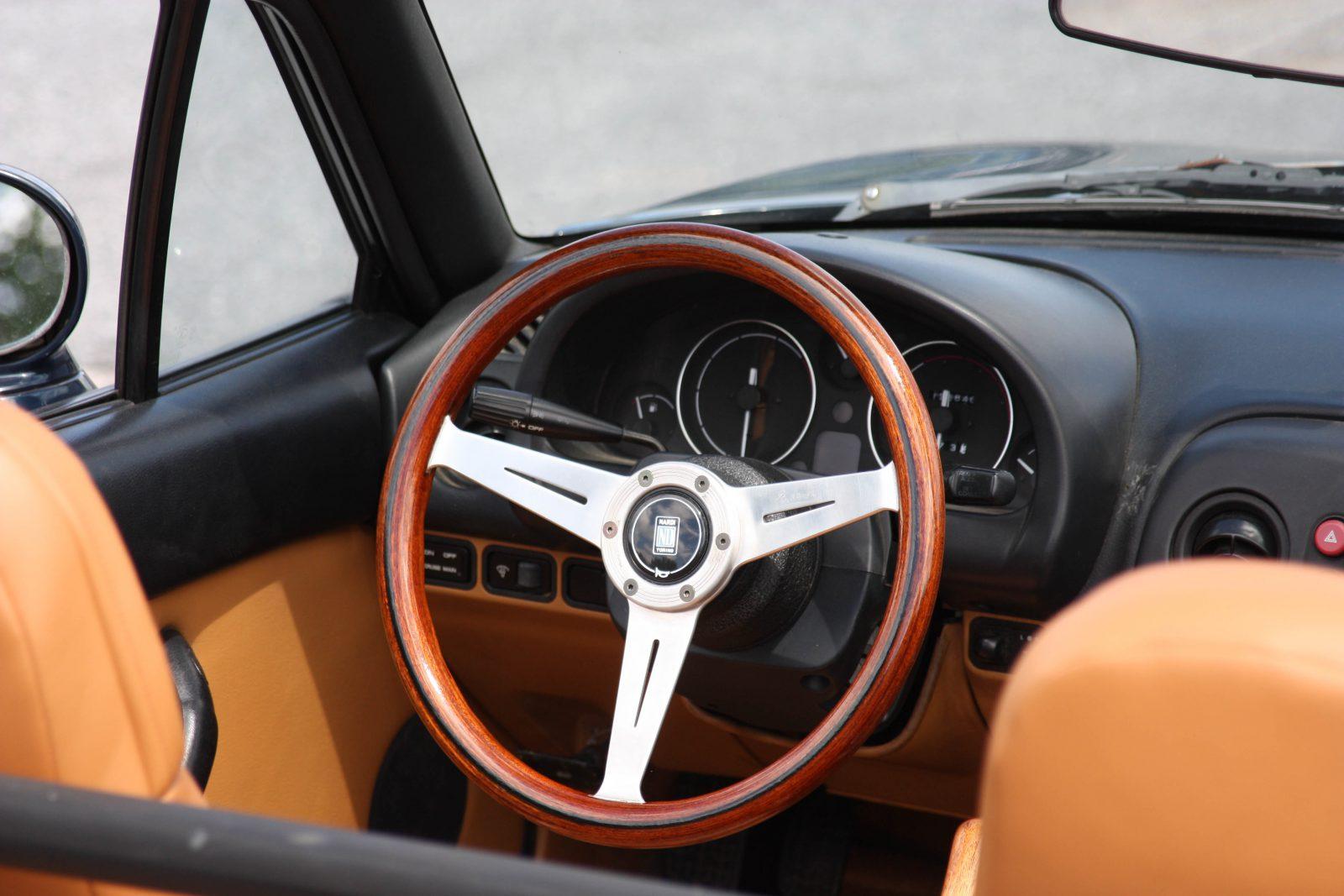 You have to remove the wheel to fix it. steering wheel slightly off center
