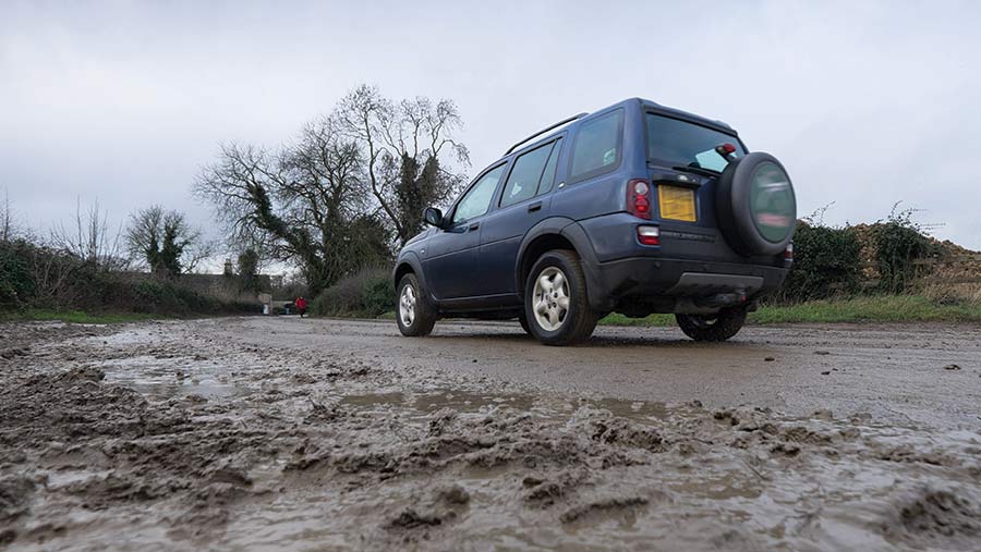 Car on a muddy road. squealing brakes