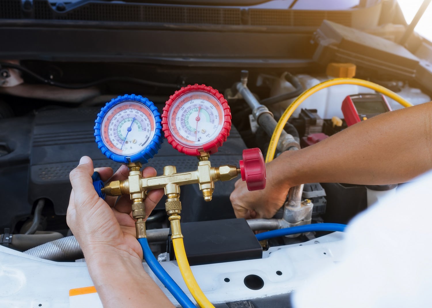 Measure Car AC pressure to identify the refrigerant leak. car ac blows hot air