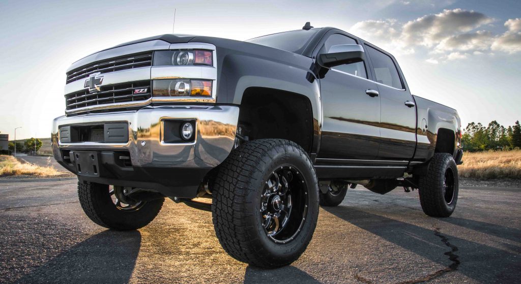 Choose a vertical surface to focus the light on Adjust the headlights using the adjusting screws