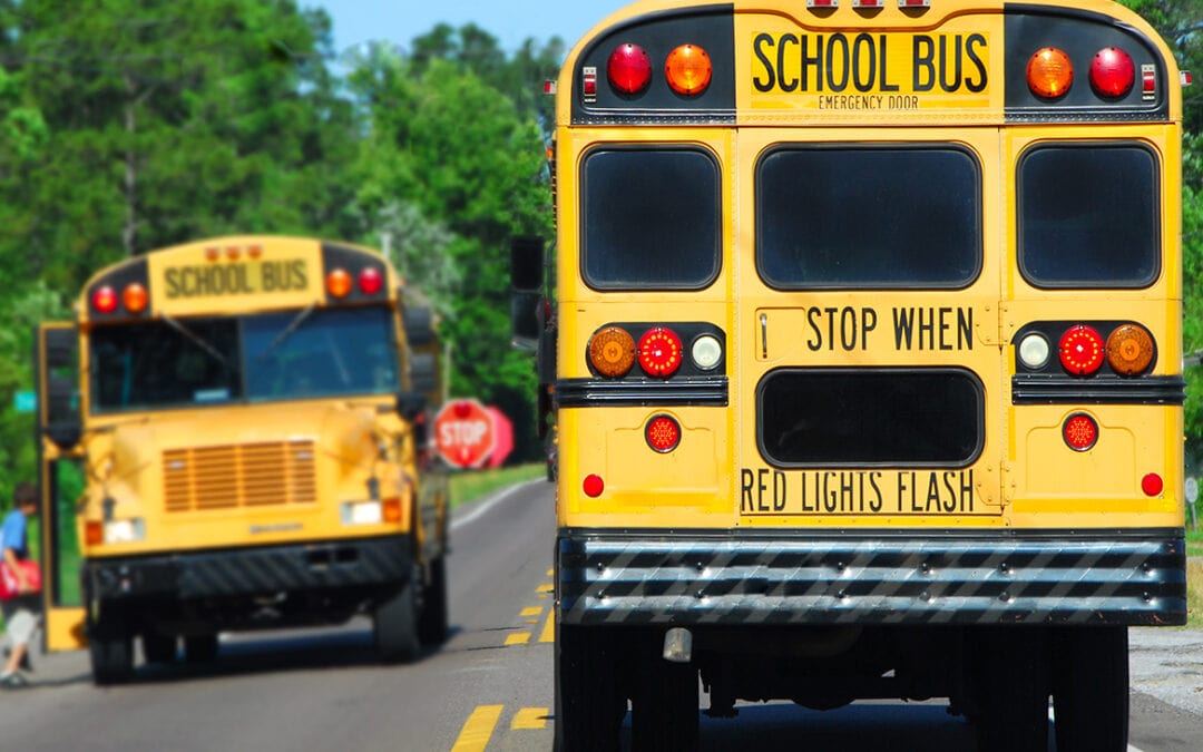 school bus red lights flash warning