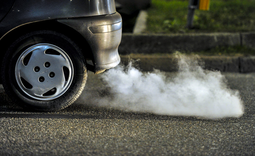 Car Exhaust Fume what happens if you overfill your gas tank