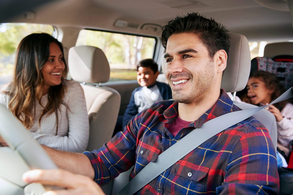 Family in the car Vaping while driving