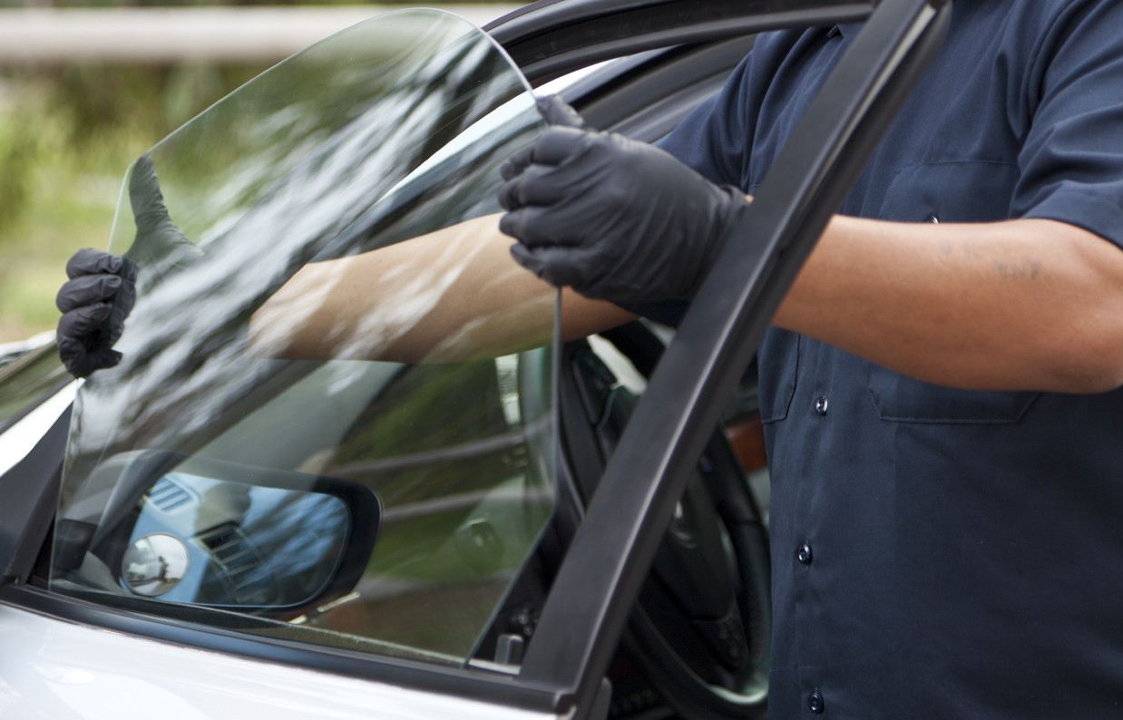 Handle the glass carefully. replacing car window glass